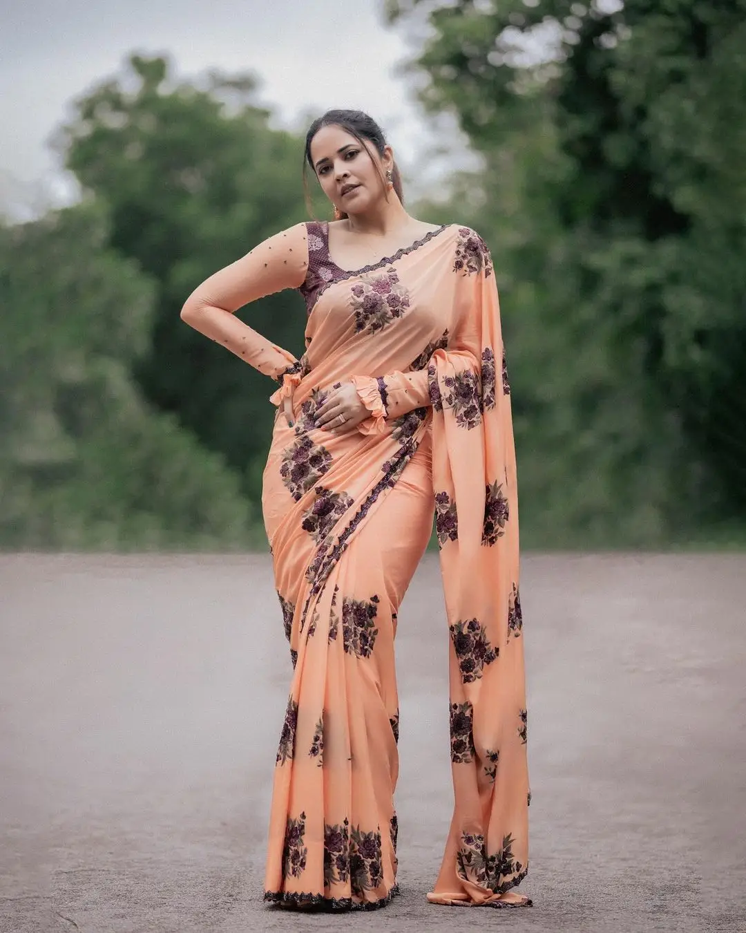 Anasuya Bharadwaj Wearing Beautiful Earrings Orange Saree Blouse